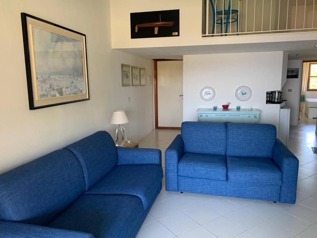 Residenze Coda Cavallo ซาน เตโอโดโร ภายนอก รูปภาพ